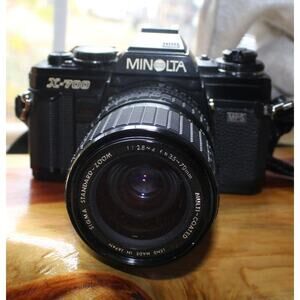 Minolta X-700 35mm film SLR camera, with a Sigma Standard-Zoom 1:2.8-4 f=35-70mm